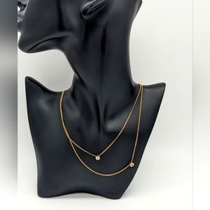 adjustable gold tone 19" long Two string necklace with two CZ stones